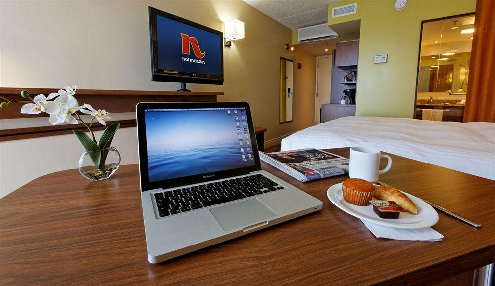 Hotel & Suites Normandin Quebec Bagian luar foto