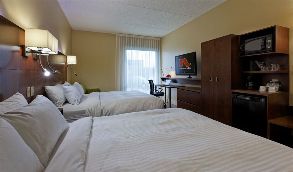 Hotel & Suites Normandin Quebec Bagian luar foto